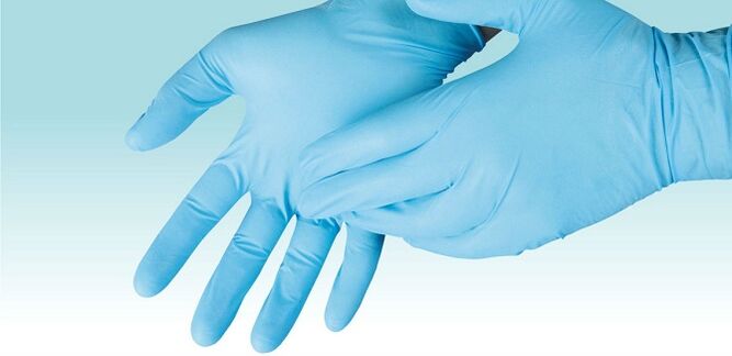 Use disposable gloves to protect hands when treating feet from fungal infections